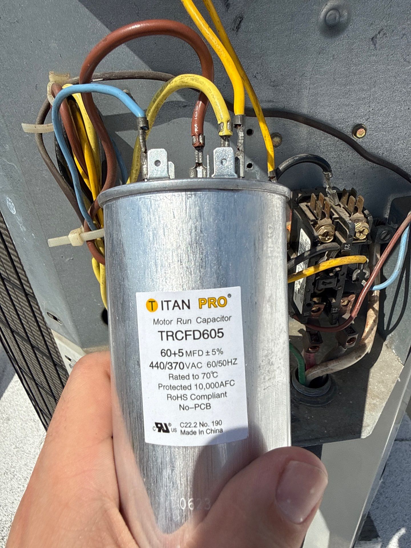 A worn run capacitor caught by VORXS during an Orange County AC tune-up before it caused a no-cool breakdown