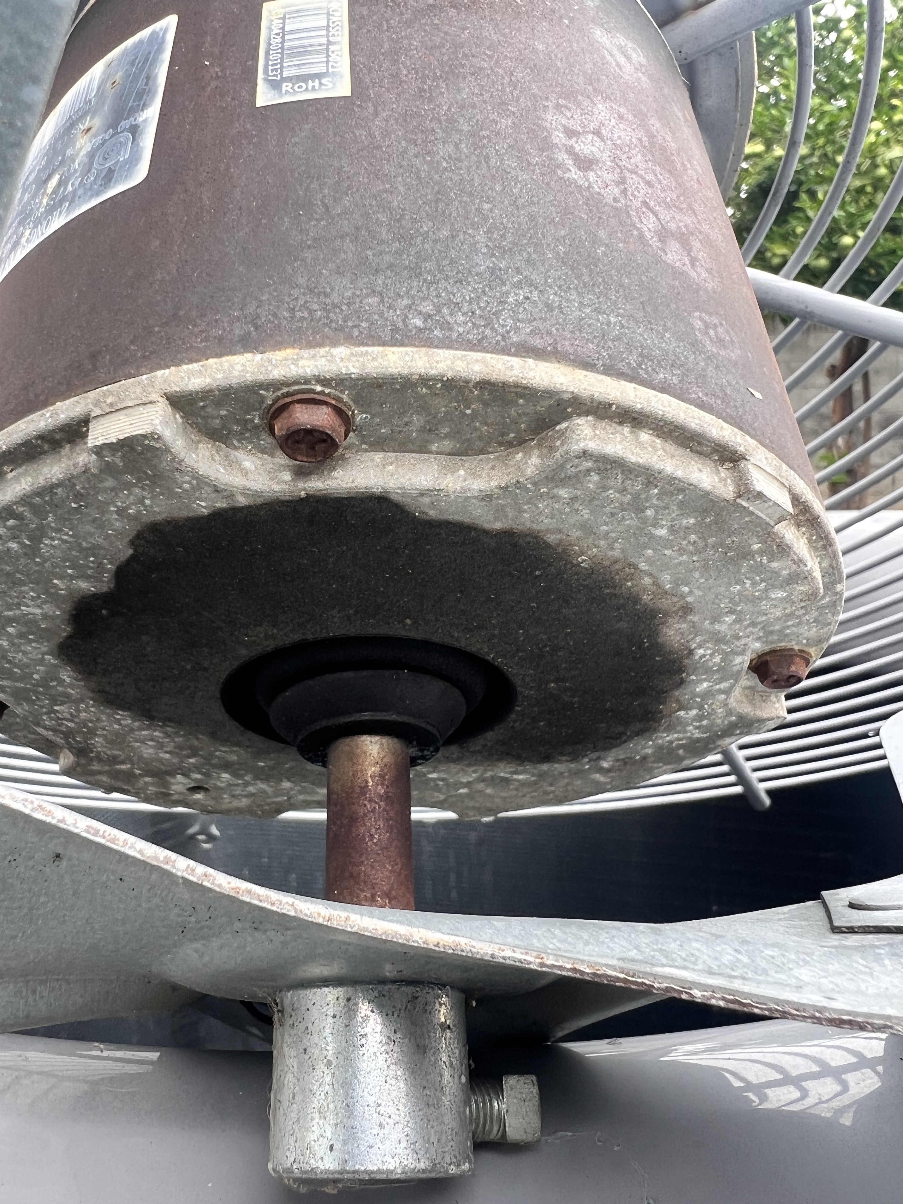 VORXS technician replacing a failed AC condenser fan motor and starter capacitor during a summer heat wave