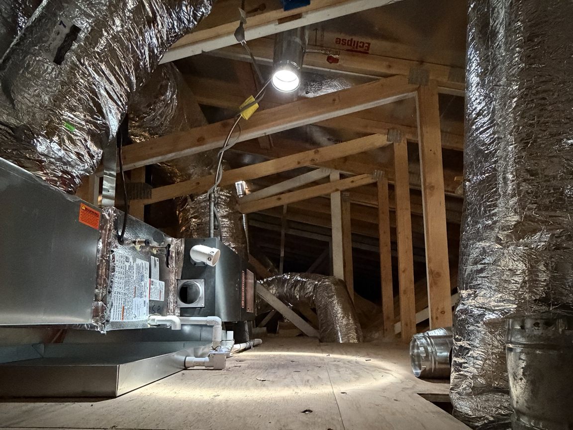 Completed attic HVAC installation by VORXS Heating and Air Conditioning
